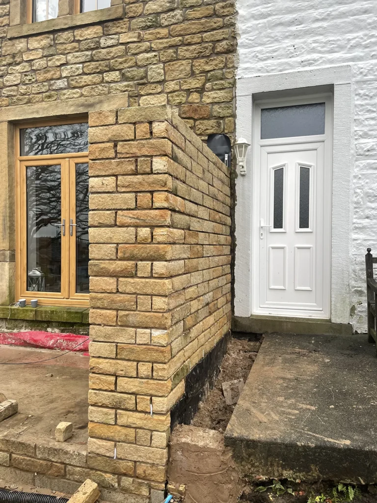 Stone Masonry Wall Construction with Circular Window Openings