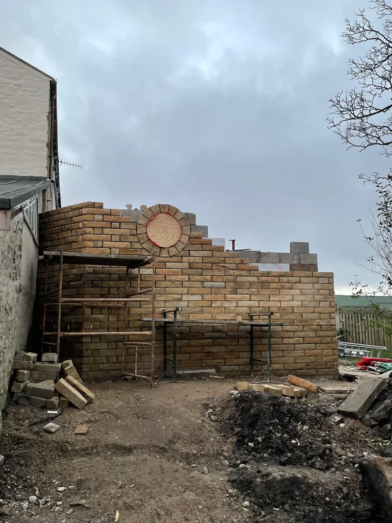 Stone Masonry Wall Construction with Circular Window Openings