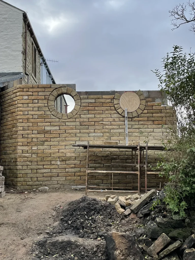 Stone Masonry Wall Construction with Circular Window Openings