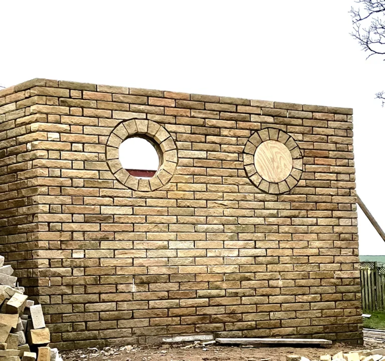 Stone Masonry Wall Construction with Circular Window Openings