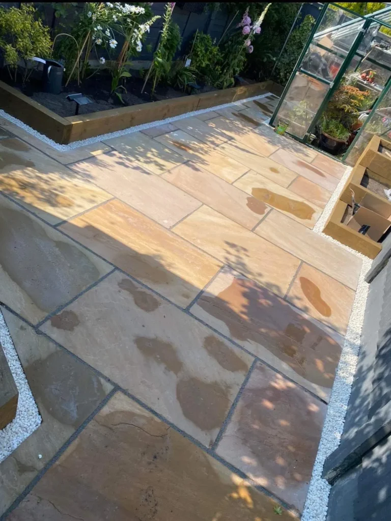 Indian Flagstone Patio Installation with Raised Flower Beds