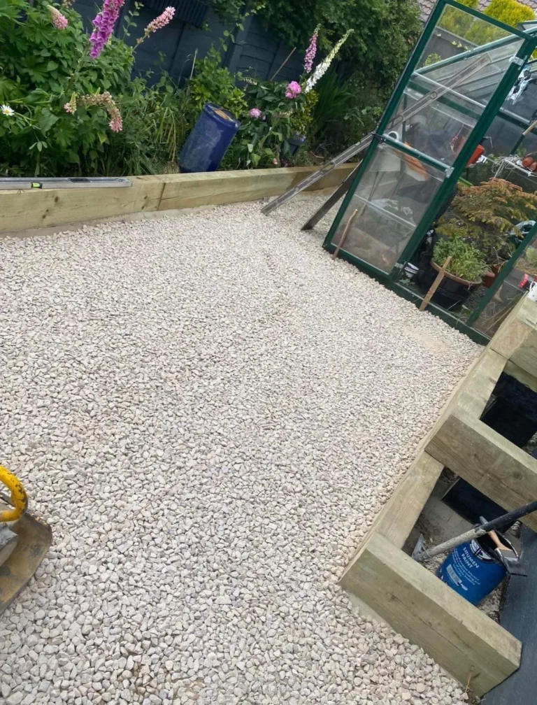 Indian Flagstone Patio Installation with Raised Flower Beds