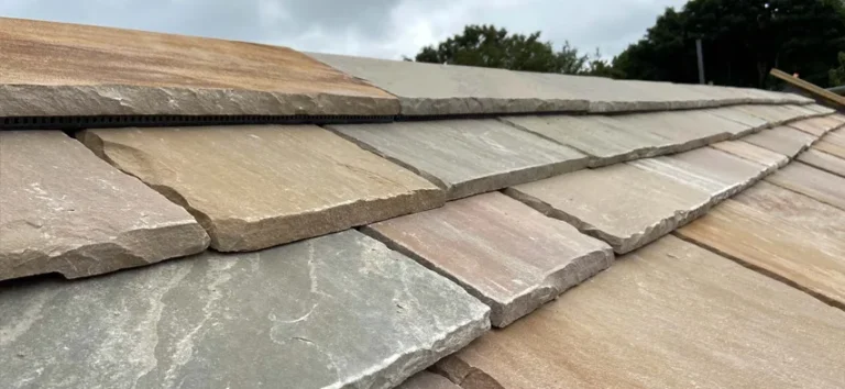 Aerial view of a slate roof on a residential building.